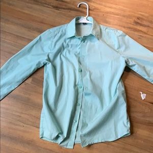 A green button down shirt